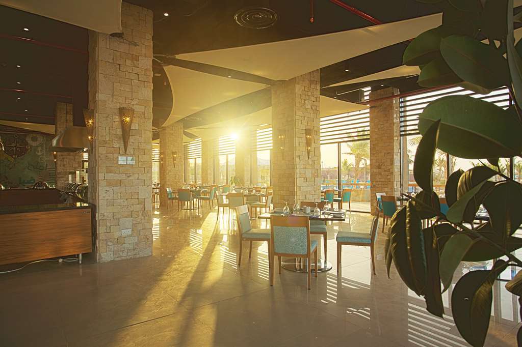 Golden Tulip Sharma Resort ร้านอาหาร รูปภาพ